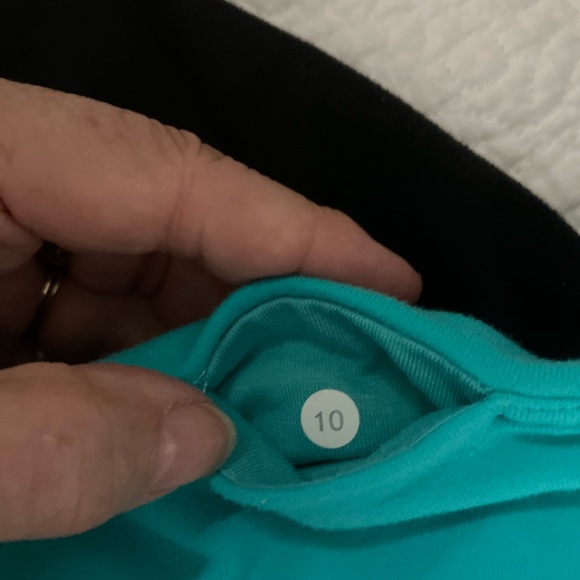 Lululemon Leggings Drawstring Hem Sz 10. Turquoise wide waist w/ black leggings. - Picture 2 of 5